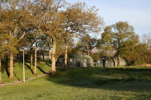 Camp - Nissan Huts hidden in the trees