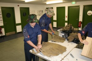 Steps 4-6 - McCabe and Kerr cutting bags into inch wide lengths